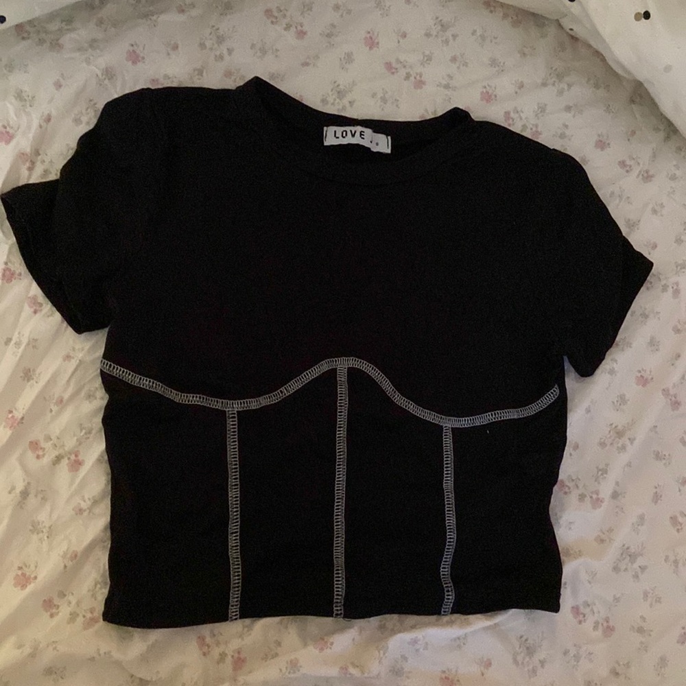 black crop top with white seams